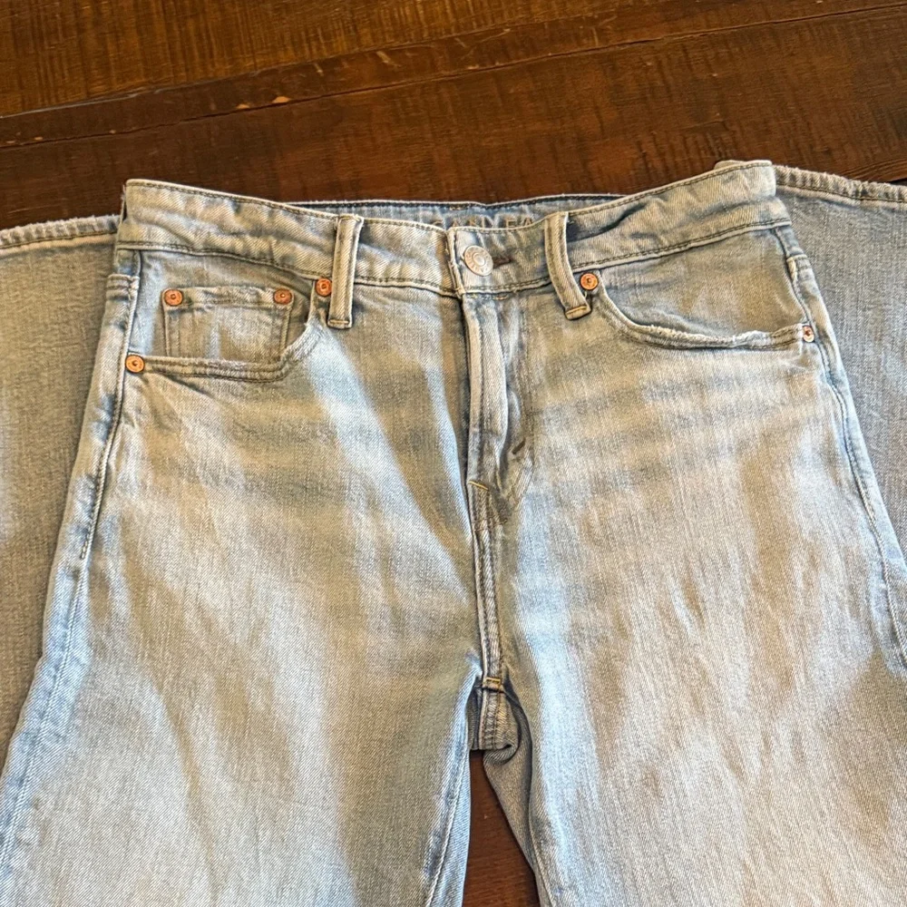 American Eagle Outfitters Light Blue Jeans with Brown Patch - Picture 4 of 6